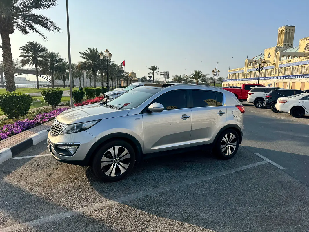 Kia Sportage 2014 — photo 1 of 7