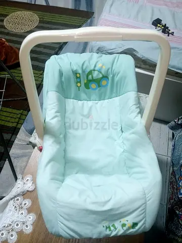 Light green padded baby carry seat / infant carrier (soft cushion) - good condition