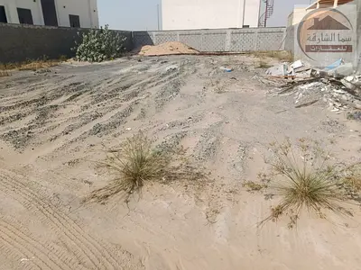 Residential land for sale in Al Houshi, Sharjah, prime location, freehold ownership