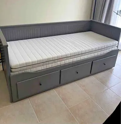 IKEA Hamnes Day bed with 3 storage drawers underneath and with 2 IKEA mattresses