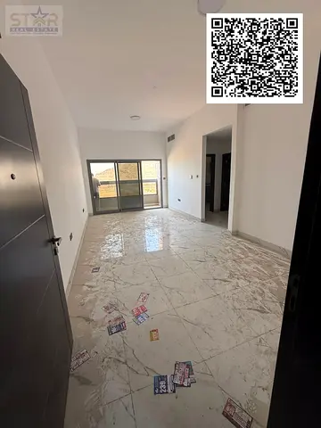 One-bedroom apartment with a living room, first tenant, with one month free, annual rent in Ajman Al Jurf 3