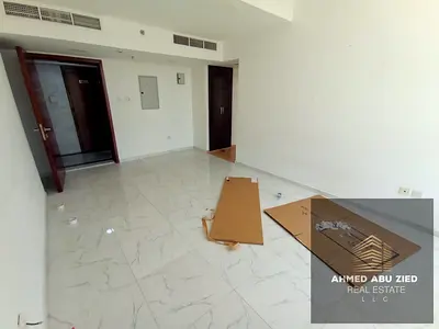 English: 2BR hall apartment for rent in Al Majaz 3, 2 baths, central AC, wardrobes, parking and gym, prime location, 55,000 in 4 payments, 2000 deposi