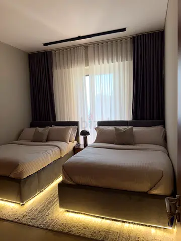 Modern upholstered bed frame with mattress and bedside setup (set of 2 beds)