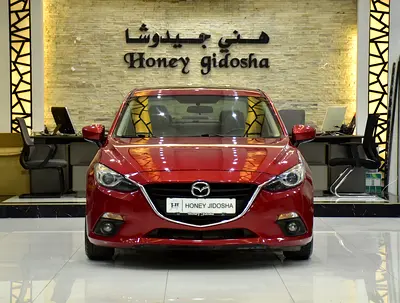 EXCELLENT DEAL for our Mazda 3 ( 2015 Model ) in Red Color GCC Specs