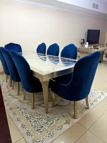 Dining table and 8 chairs for sale