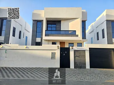 Luxury villa in Al Zahia, Ajman, ready for immediate occupancy, featuring high-end finishes and spacious living areas. Freehold ownership available to