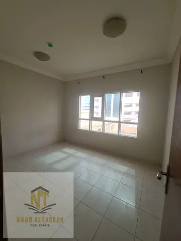 Two rooms, a living room, and two bathrooms, a minute from the Corniche
