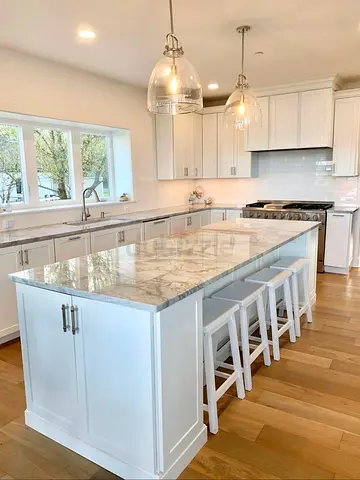White Kitchen Island with Marble Top and Storage Cabinets