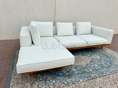 West Elm L Shape Sofa Beige Light beige L-shaped sectional sofa with chaise (wooden base)