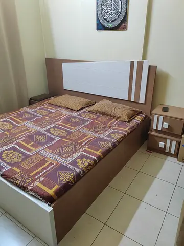 Double King Bed with Headboard and Matching Nightstand - Good Condition