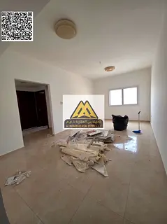 A spacious 2-bedroom apartment with a living room for annual rent in Al Jurf 2 – Ajman. It feature