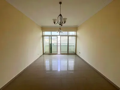 Spacious 2-Bedroom Apartment for Rent in Al Qassmia Al Nad – With Parking and Balcony