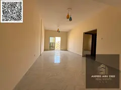 Stylish 1BR apartment, hall, 2 baths, free parking, balcony open view, central AC, spacious layout,