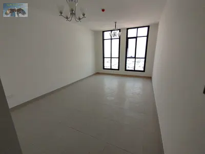 Two-bedroom apartment with a living room – private parking inside the tower, one month free – built-in wardrobes – a great opportunity to live in a vi