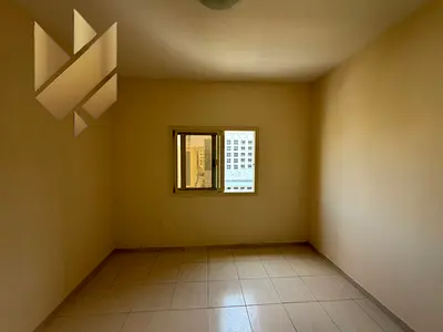 For annual rent: a one-bedroom apartment in New Muwailih, featuring excellent finishing, spacious rooms, and a wonderful view.