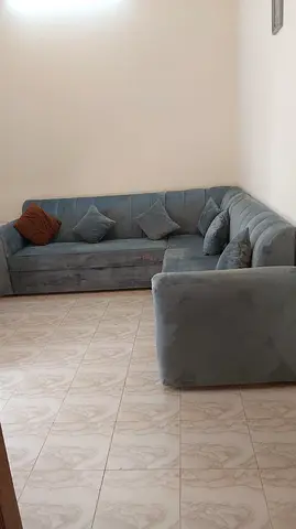 L-shaped grey velvet corner sofa - good condition