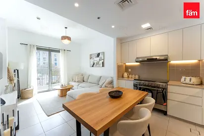 Balcony overlooking sparkling pool Bright & Airy