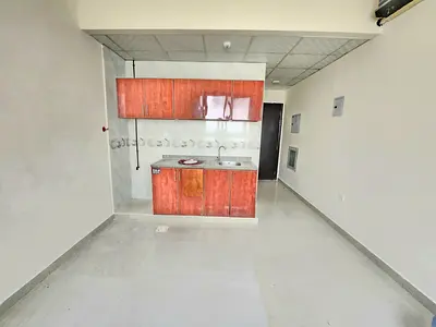 READY TO MOVE LAVISH STUDIO ON ROAD BUILDING IN MUWAILEH