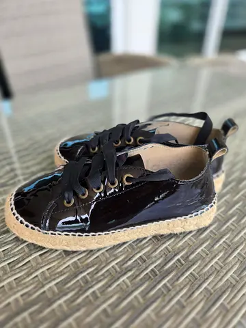 Black leather patent espadrille-style sneakers, gently used. Brand Mahebi, made in Spain.