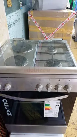 Used freestanding electric oven with 4-burner hob (stainless finish)