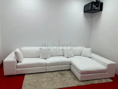 Excellent condition eichholtz brand white color lshape sofa