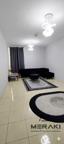 One-bedroom apartment with a living room for yearly rent at Orient Towers, with a view of the creek.