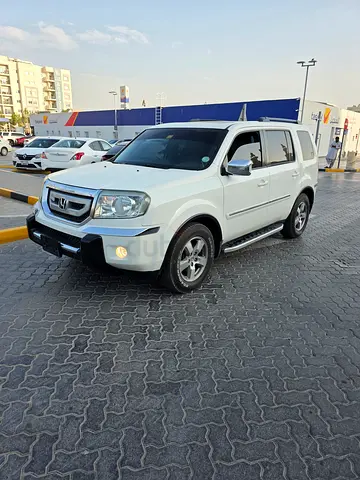 Honda pilot 2011 model Gcc perfect condition Service History perfect condition No issue .