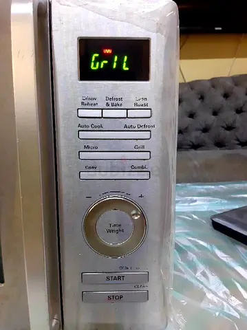 Stainless Steel Microwave Oven with Grill Function - Good Working Condition