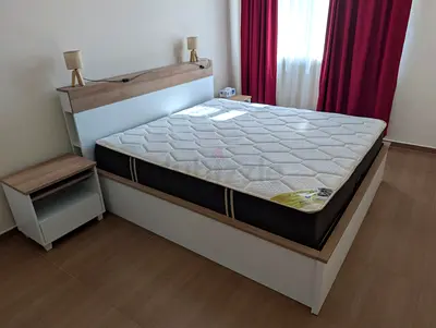 King size bed with mattress ans side table