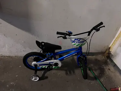 Childrens 14-inch Spartan bike with training wheels - good condition