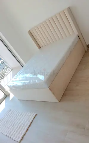 Brand New Queen size upholstered bed with storage - cream