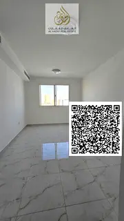 1BR apartment in Al Jurf 3, excellent finishing, opposite school, behind China Market, 2 baths, balc
