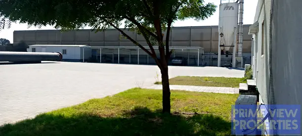 Warehouse with office and storage yard for sale