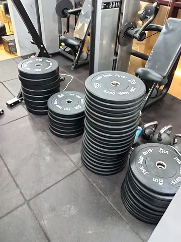 Set of Black Rubber-Coated Weight Plates (Various Sizes) - Good Condition