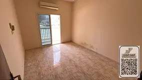 Two-bedroom apartment with living hall for annual rent in Al Rashidiya 3 – Ajman, located in a con