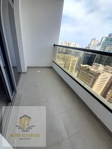 Two-bedroom master bedroom apartment with a living room and free parking for annual rent in Al Khan – a steel building with distinctive features