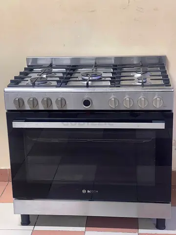 Bosch 5 burner full gas cooker with fan oven same like new condition