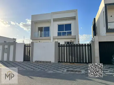 Luxury villa for sale in Al Zahia, Ajman, with a modern design and ultra-luxurious finishing in a p