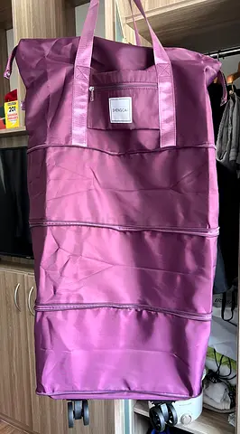 Lightweight Purple Roller Duffel Bag with Multiple Zip Compartments