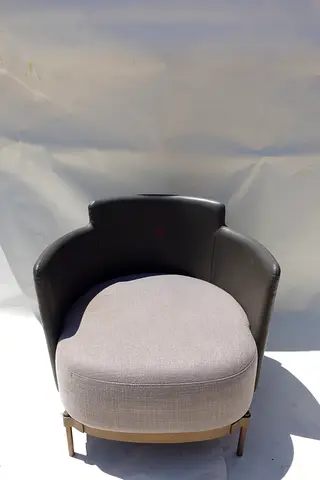 (52-B)  Modern Chair with a Sleek, Curved Design