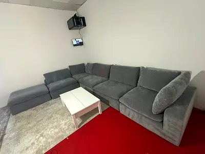 As perfect condition pan Emirates modular sofa