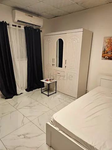 White 2-Door Wardrobe with Mirror — Good Condition