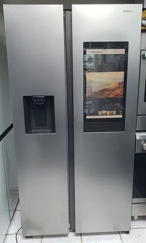 Samsung Side-by-Side Refrigerator with Built-in Touch Screen and Water Dispenser