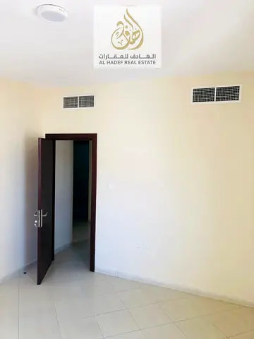 One bedroom apartment for rent in Sharjah Al Butina balcony new kitchen family building flexible payment