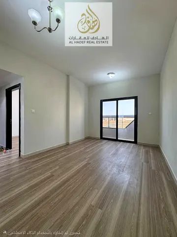 Al Jurf 3, on Mohammed Bin Zayed Road, prime location close to services and the mosque - 2 bedrooms, living room, 2 bathrooms with balcony - spacious,