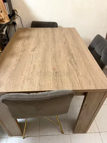 Solid wood-look dining table, seats 4, good condition