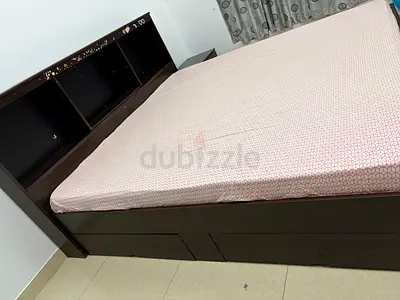 King Size bed with mattress and small cabinet