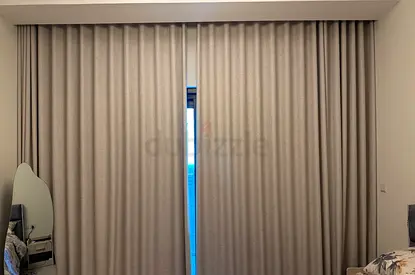 Light beige fabric black-out curtains with ceiling track (fits wall 3.7m wide and 3.3 high)