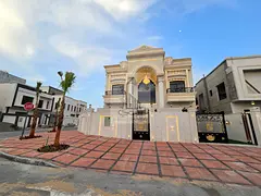 Luxury villa for sale in Ajman, including registration fees.