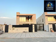 Luxury villa with a modern design, 5000 sq ft, with a garden, behind Ajman Academy. Price includes a